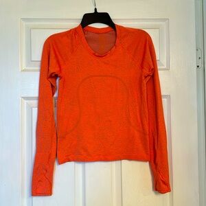 Lululemon size 6 long sleeve drifit top. Excellent condition